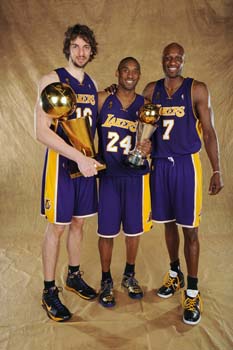 ORLANDO, FL - JUNE 14: Pau Gasol #16, Kobe Bryant #24 and Lamar Odom #7 of the Los Angeles Lakers pose for a portrait after defeating the Orlando Magic in Game Five of the 2009 NBA Finals at Amway Arena on June 14, 2009 in Orlando, Florida. The Los Angeles Lakers defeated the Orlando Magic 99-86. NOTE TO USER: User expressly acknowledges and agrees that, by downloading and or using this photograph, User is consenting to the terms and conditions of the Getty Images License Agreement. Mandatory Credit: 2009 NBAE  (Photo by Andrew D. Bernstein/NBAE via Getty Images)