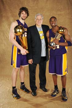 ORLANDO, FL - JUNE 14: Pau Gasol #16, Phil Jackson and Kobe Bryant #24 of the Los Angeles Lakers pose for a portrait after defeating the Orlando Magic in Game Five of the 2009 NBA Finals at Amway Arena on June 14, 2009 in Orlando, Florida. The Los Angeles Lakers defeated the Orlando Magic 99-86. NOTE TO USER: User expressly acknowledges and agrees that, by downloading and or using this photograph, User is consenting to the terms and conditions of the Getty Images License Agreement. Mandatory Credit: 2009 NBAE  (Photo by Andrew D. Bernstein/NBAE via Getty Images)